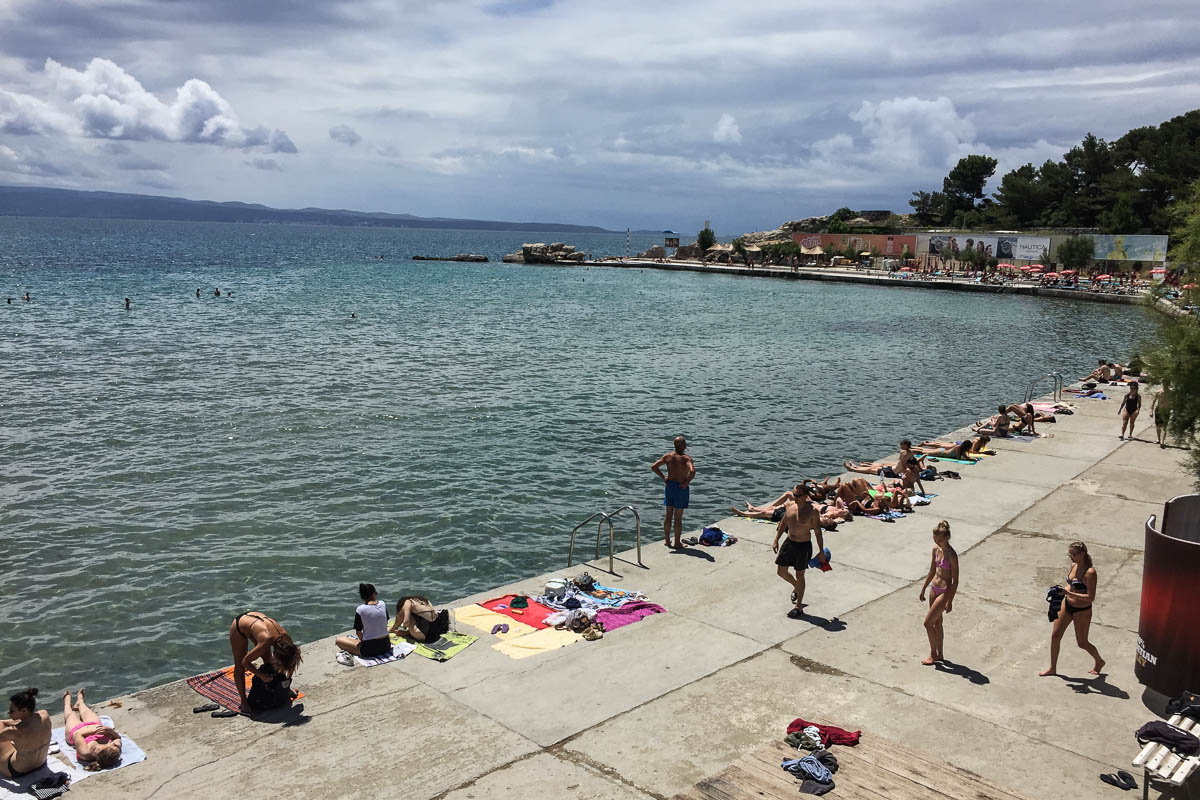 People laying on concrete