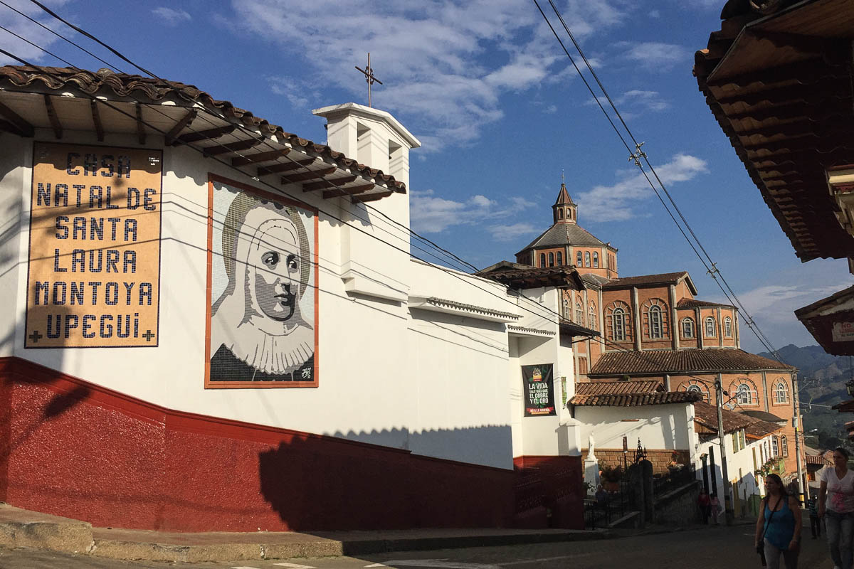 Sister Laura Montoya with the back of the cathedral in the background