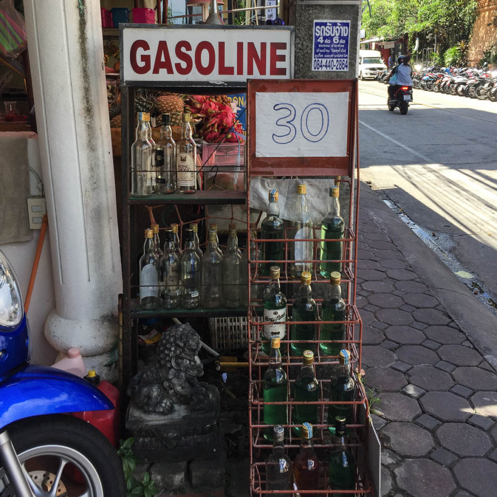 We saw these all over Thailand. A liter of gas for a $1 for motorcycles and mopeds